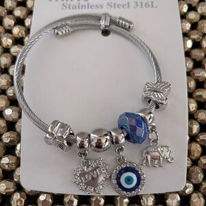 Silver Tone Charm Bracelet with Blue Accents